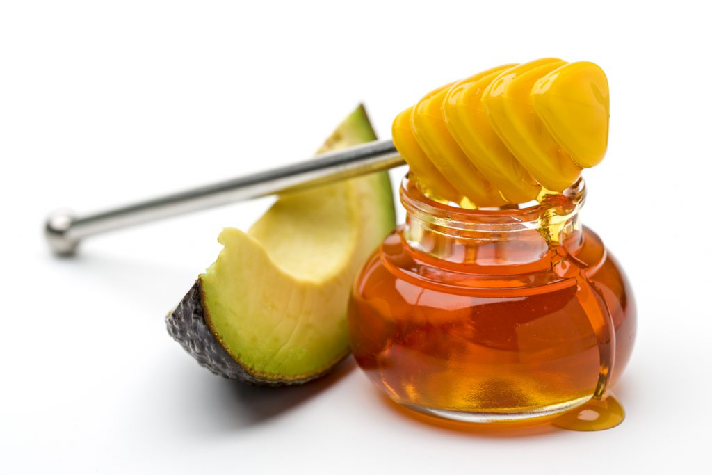 homemade cosmetics: avocado - avocado face mask stock pictures, royalty-free photos & images